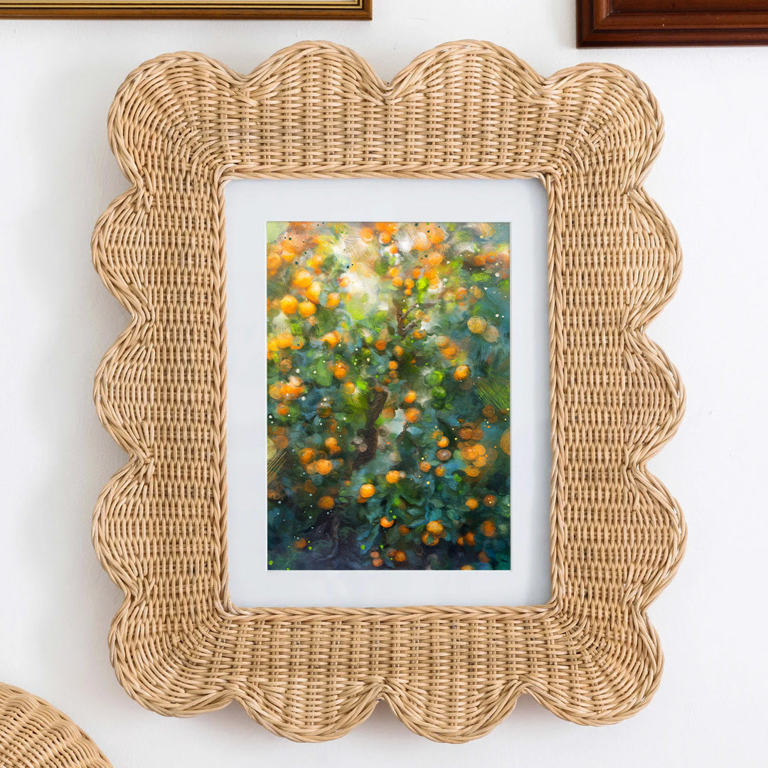 Postcard abstract art of a Florida orange tree under the sun, with lots of oranges and lots of detail framed on a wall.